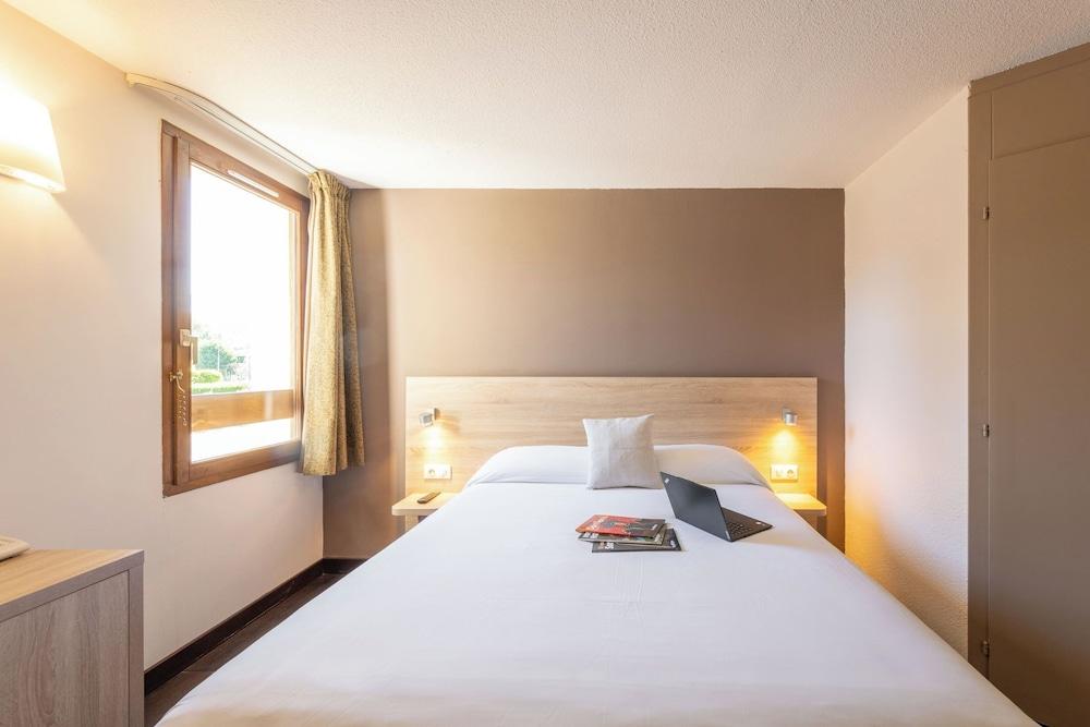 L'Hôtel des Trois Massifs