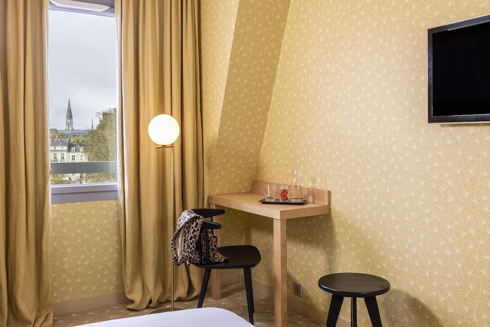 L'Hôtel - Face au Château - Boutique Hôtel et Séminaires