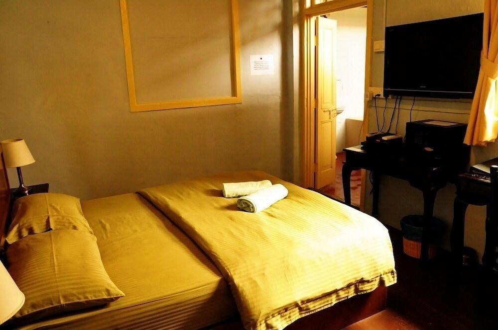 PalanquInn Heritage Suites