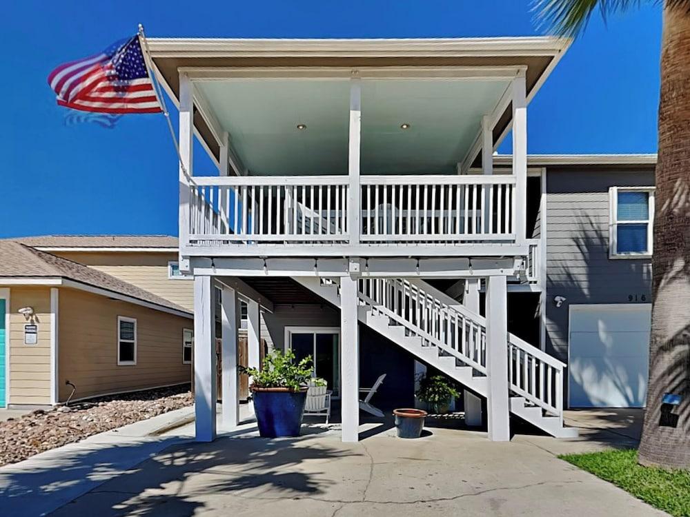 Palm Down & Relax by Silver Sands Vacation Rentals