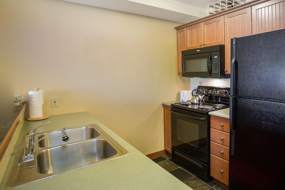 2203 - One Bedroom + Den Standard Eagle Springs East 1 Condo by RedAwning