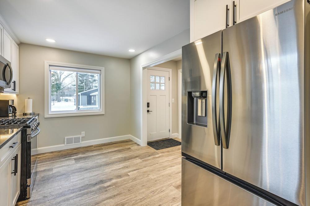 Riverfront Michigan Cottage w/ Fire Pit & Kayaks!