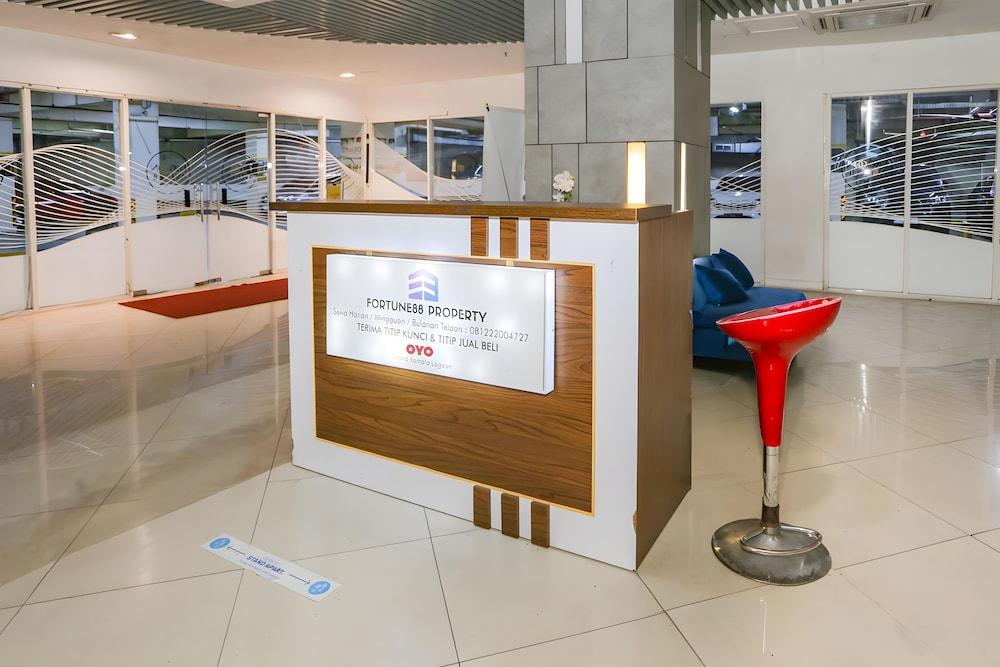 Collection O Fortune 88 Kamala Lagoon Reception at Indomaret and White Forest