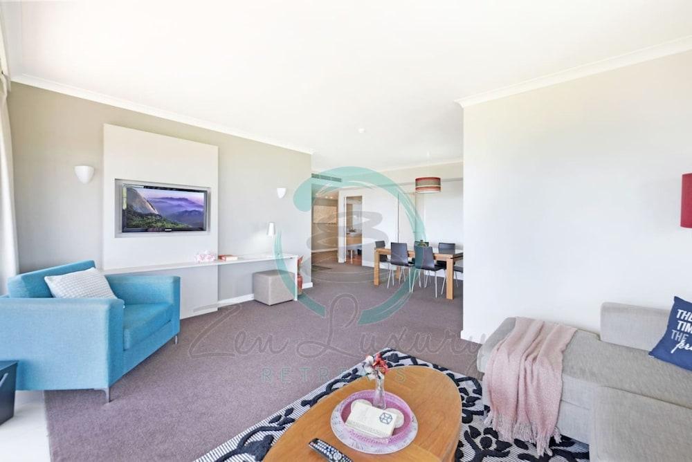 Coastal Elegance Sunset Pool Balcony Dining