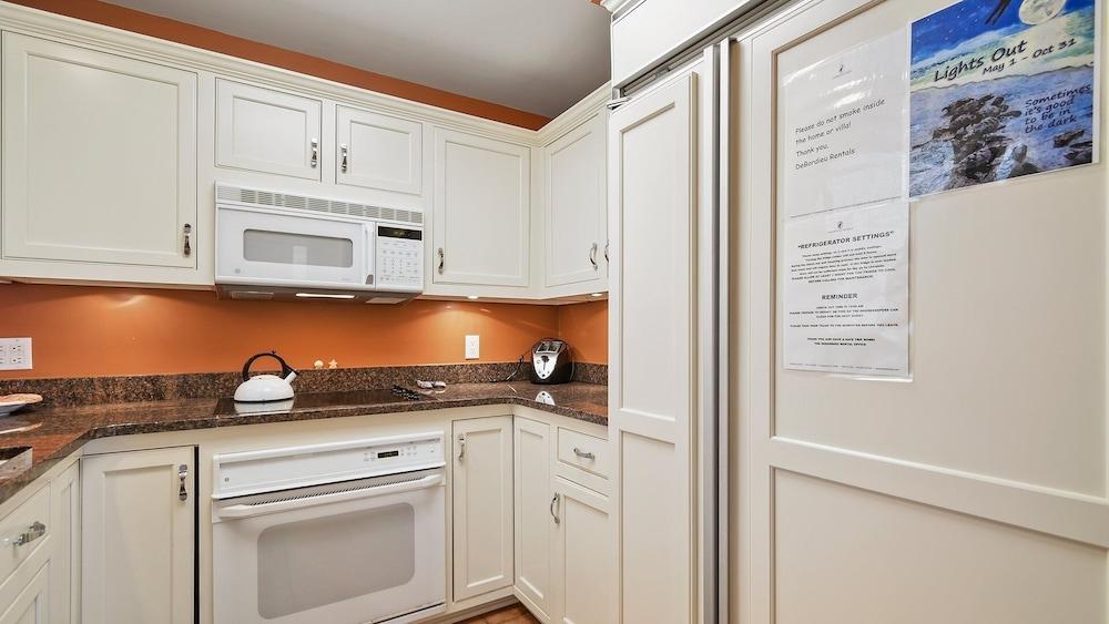 Nicely Furnished Downstairs Villa; That Opens To A Porch Overlooking The Ocean 2 Bedroom Villa by Peace Vacations