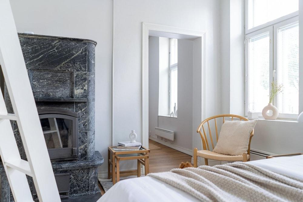 A bright wooden studio for four