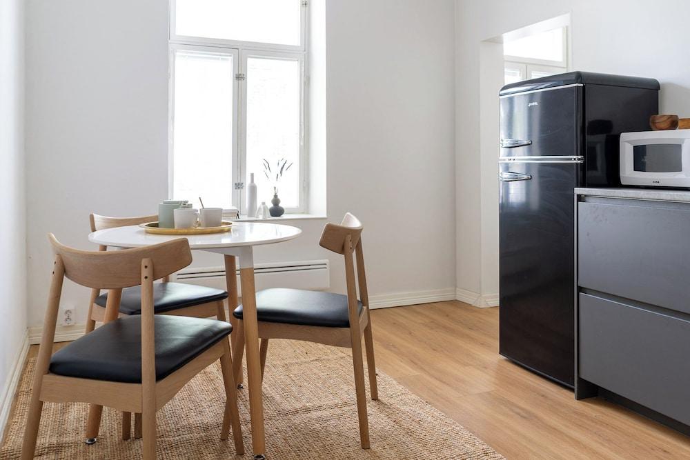 A bright wooden studio for four