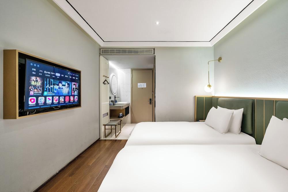 Qinfengyuan Hotel (Shanghai Xuhui District Zhongshan Hospital Jiashan Road Subway Station Branch)