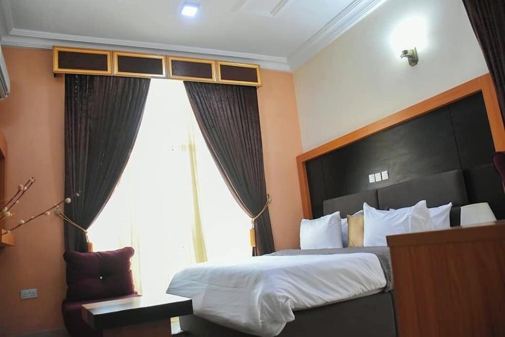 G- throne Hotel and Suites