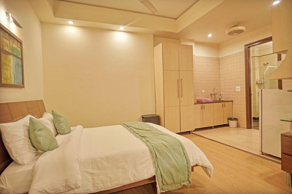 Enkay Suites - DLF CyberCity