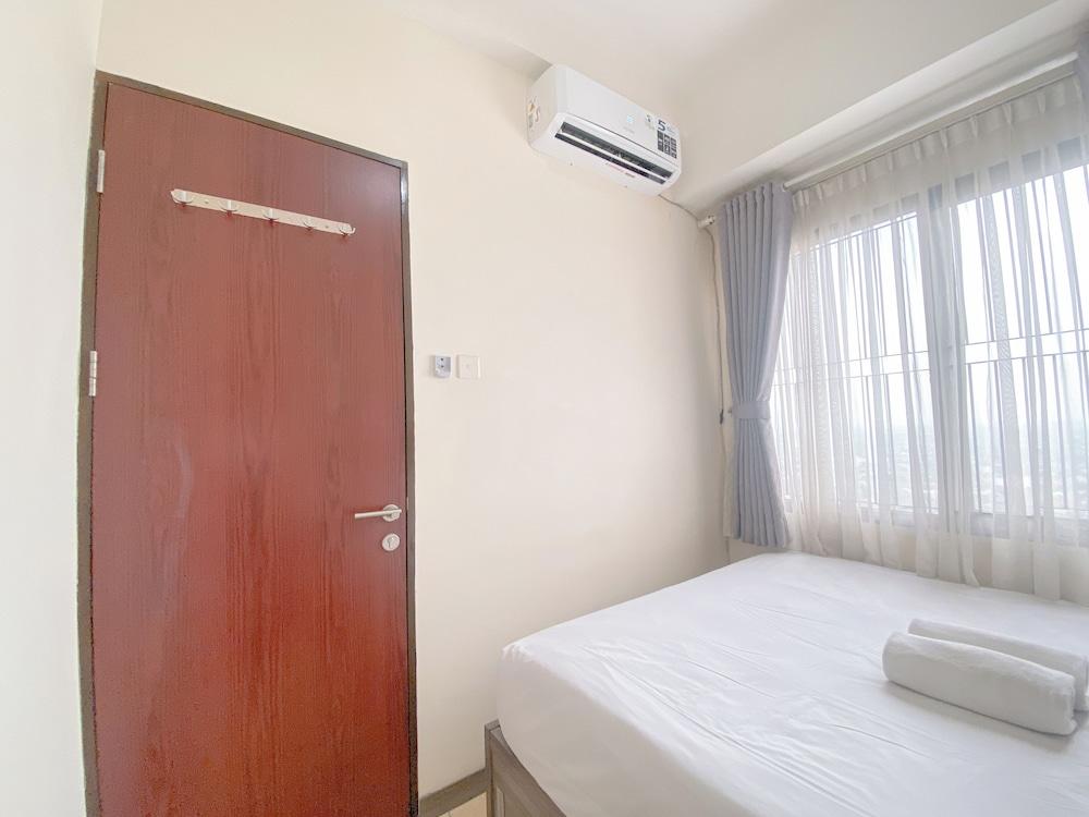 The Cozy Abode 2BR Apartment at Tamansari Panoramic