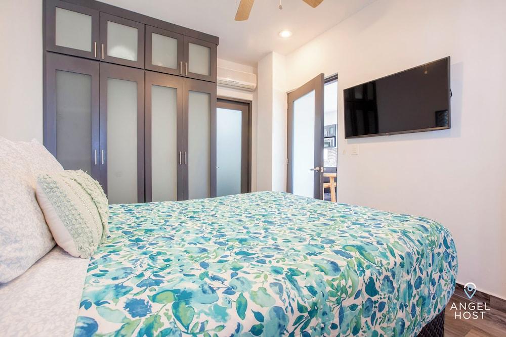 Condos Near Malecon Bay & Sunset Views