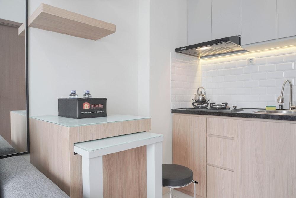 Homey and Minimalist 2BR at Podomoro Golf View Apartment