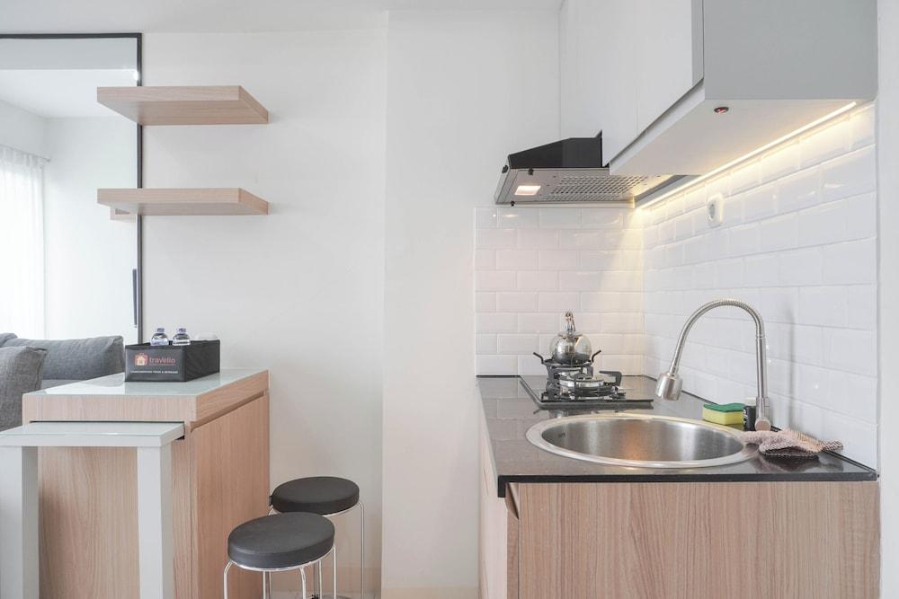 Homey and Minimalist 2BR at Podomoro Golf View Apartment