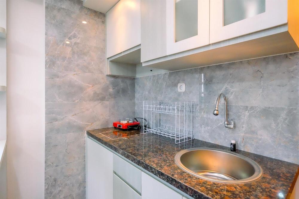 Warm and Comfortable Designed 2BR at Podomoro Golf View Apartment