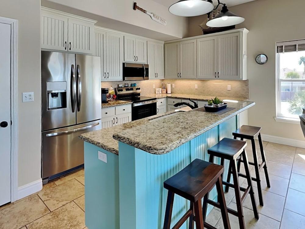 Island Charm by Miss Kitty’s