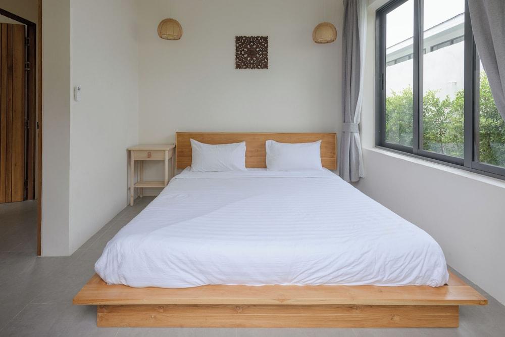 Tropical Poolside Retreat by Sea N' Rent