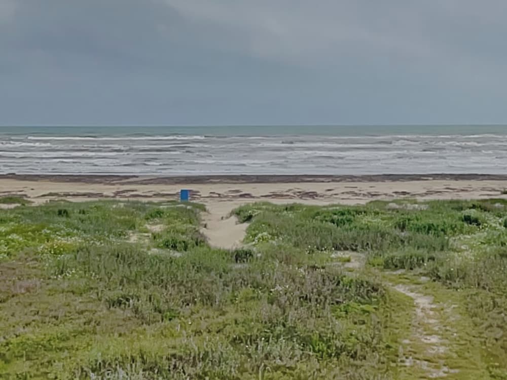 Whispering Sands Beachfront by Ryson Vacation Rentals