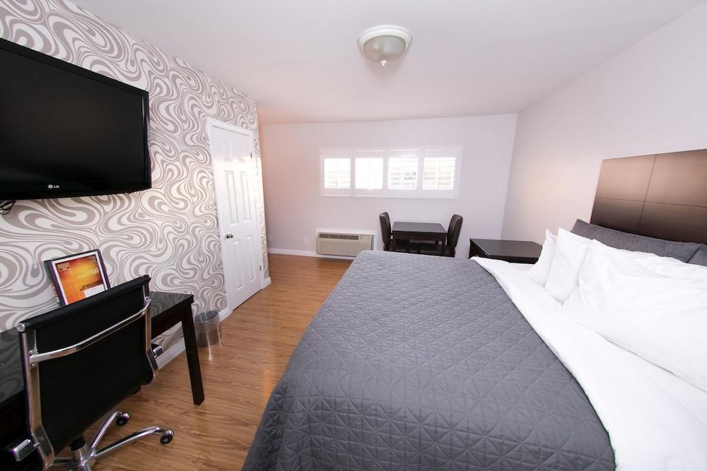 Metropolitan Inn & Suites