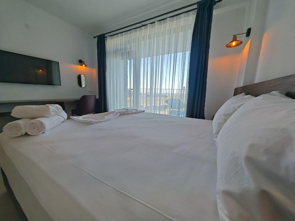 Rigani Gökçeada (+14)