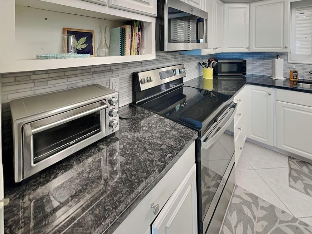 Barry Palm 202 by Distinctive Beach Rentals