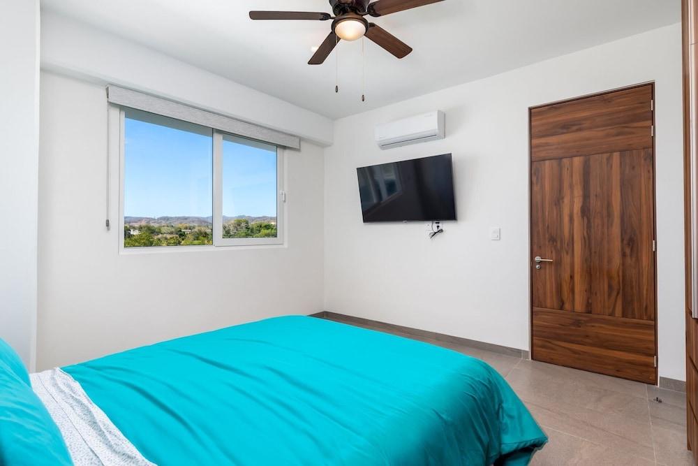 Believe Condo Flamingos Believe 302