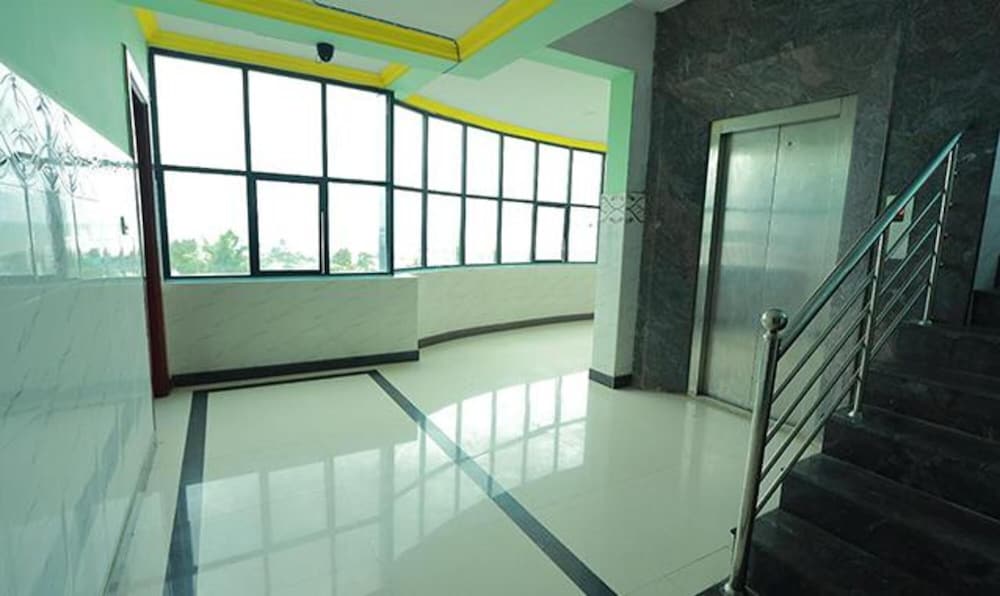 Fabhotel Amutham Residency