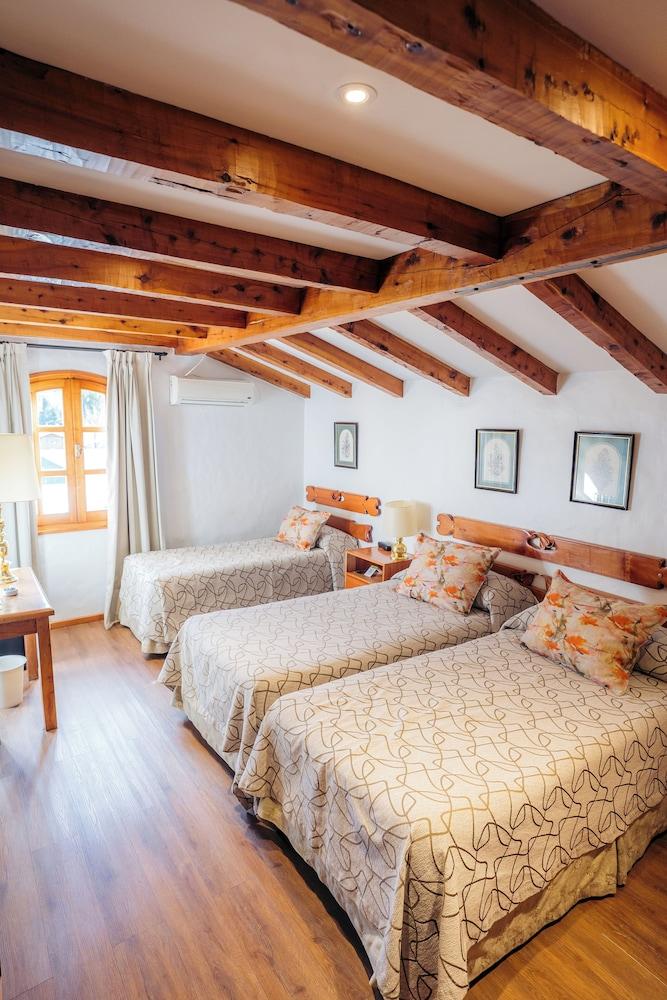 Le Village Hotel y Cabañas