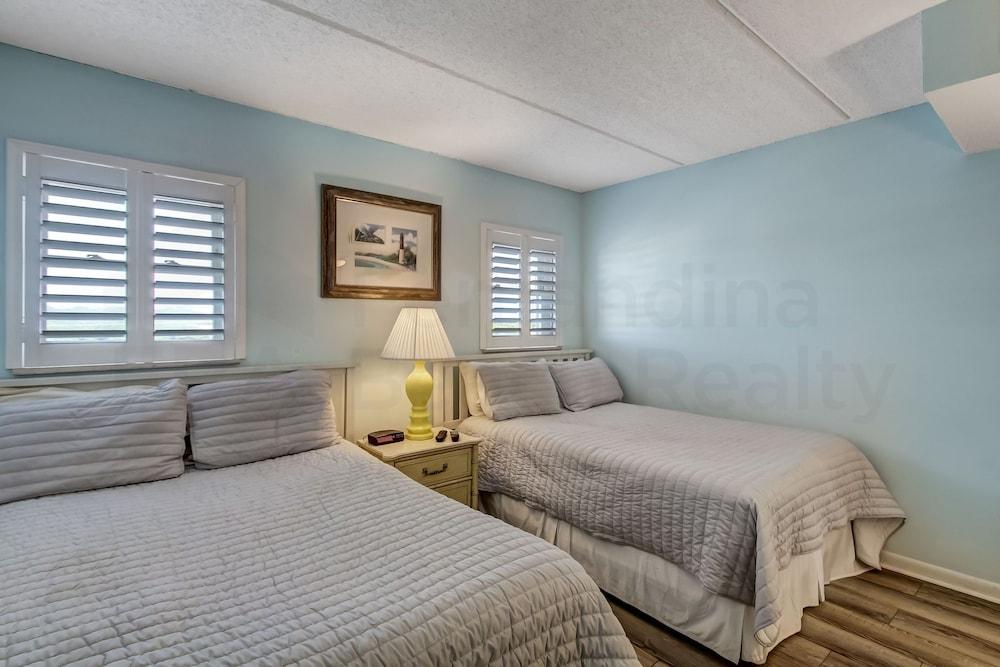 Striking Ocean View Condo with Private Walkway to the Beach by RedAwning