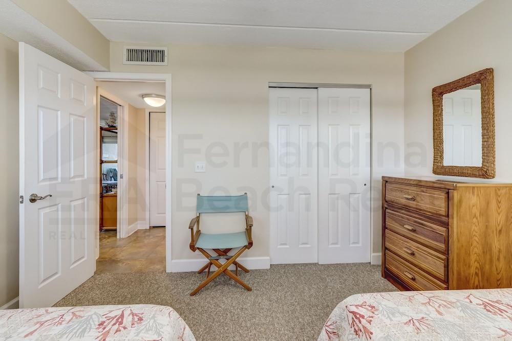 Upper unit Overlooking the Beautiful Outdoor Space and Pier by RedAwning