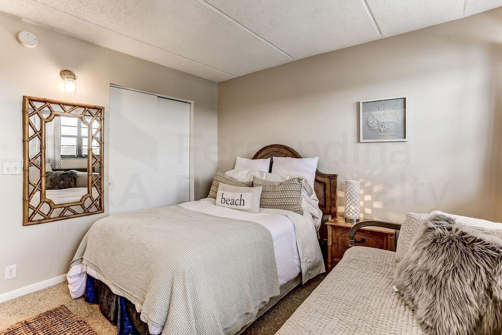 Comfy Upper Unit Condo to Enjoy the Beach or the Fishing by RedAwning