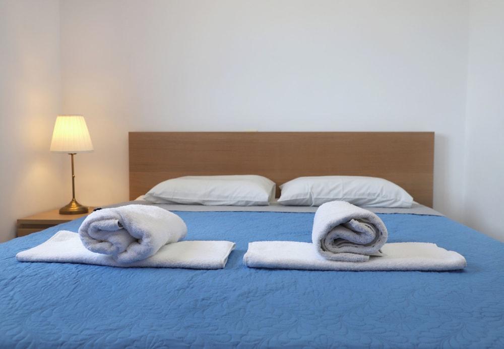 Helios Studios & Apts