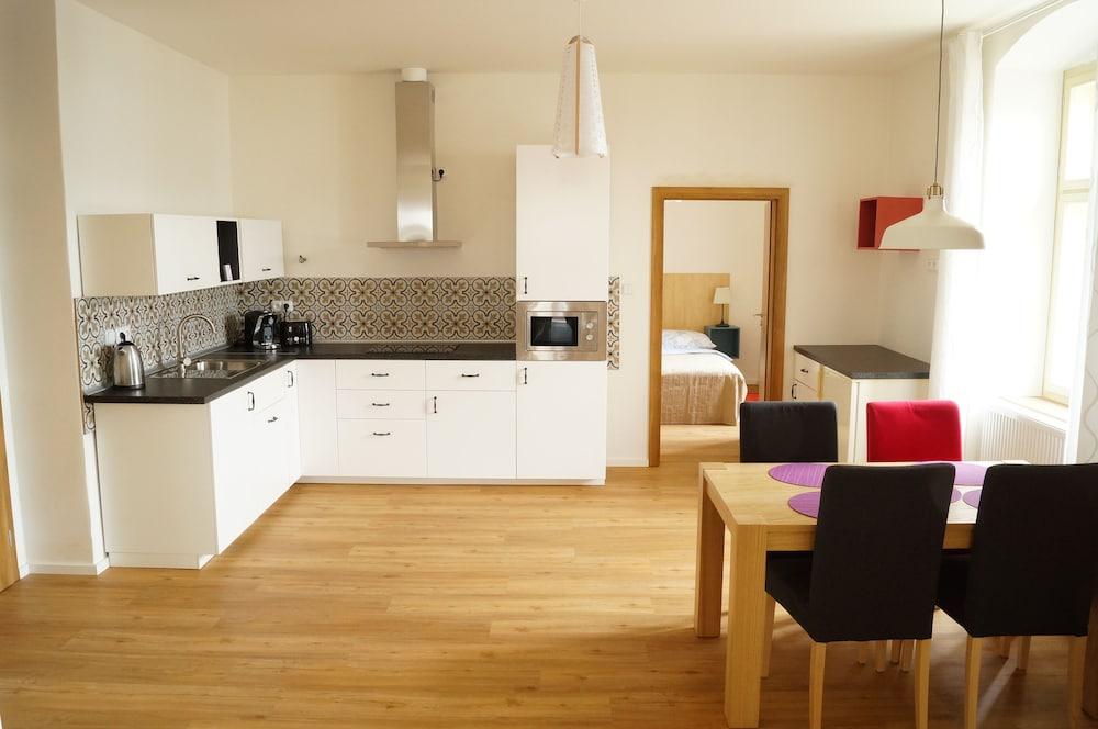 Apartmány u komína