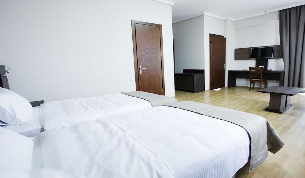 Olympus Hotel By Umbrella