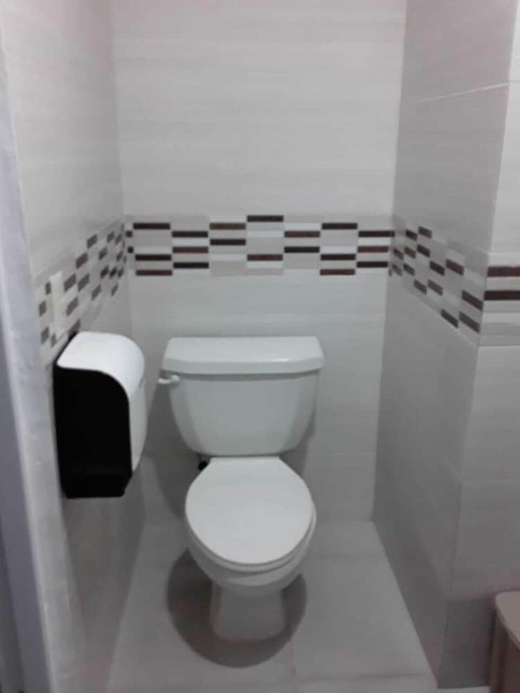 The Garden Hotel y Restaurant