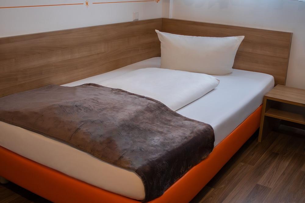 Orange Hotel und Apartments