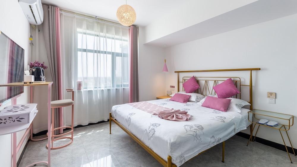 Floral Hotel Jiu Qi Yin Ju Dunhuang