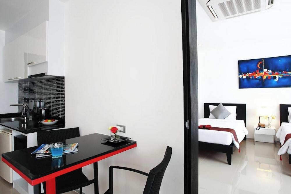 One World One Home Naiharn Hotel