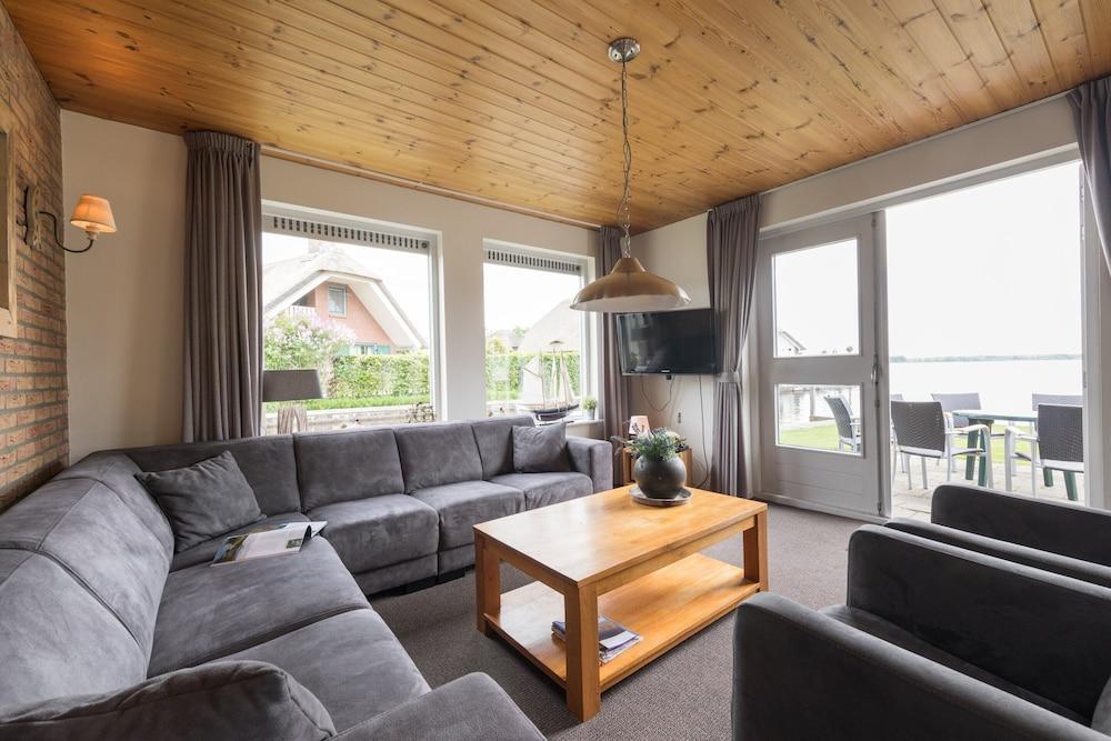 Rustic-chic Villa With Thatched Roof