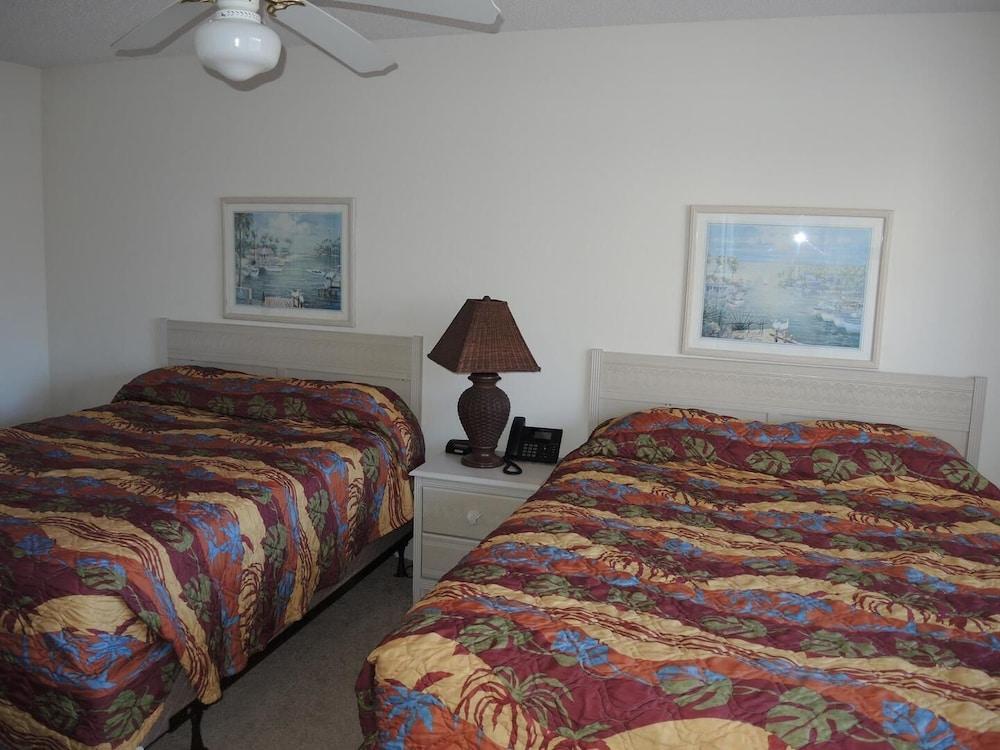 Pool View Villa 1504 with 27 hole Golf Course Onsite and Sunset Beach Nearby by RedAwning