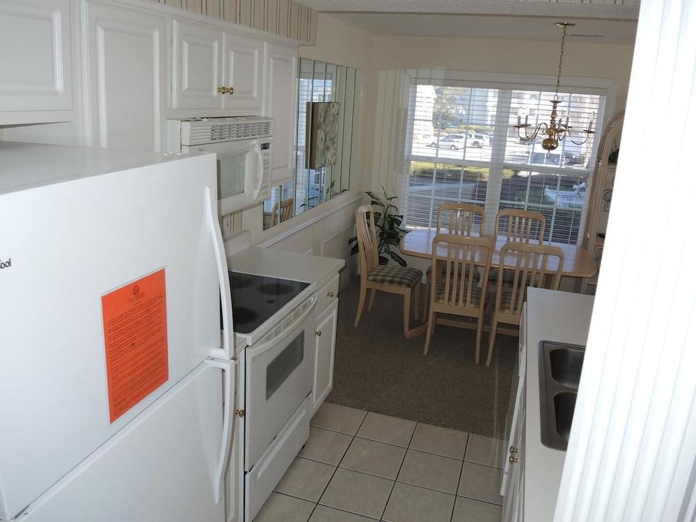 Family Friendly Condo 1504M with Resort Golf Course Onsite by RedAwning