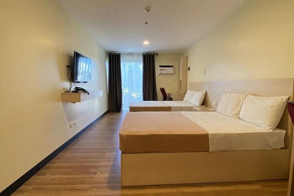 Olive Town Center and Hotel