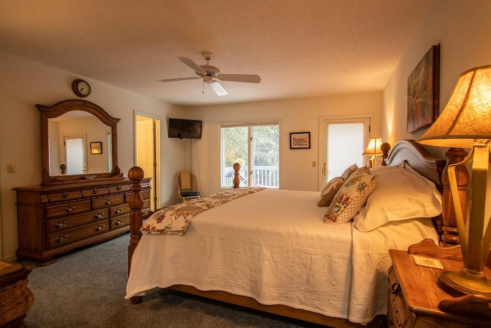 Sprawling Family Home Near Beaches With Fishing Dock & Beautiful Canal Views