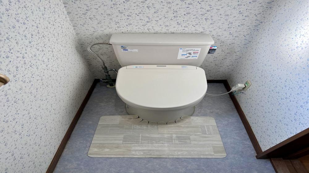 Yellow House by Lake Toya