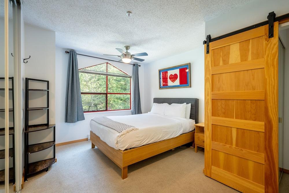 Cozy Creekside Two-Storey Condo