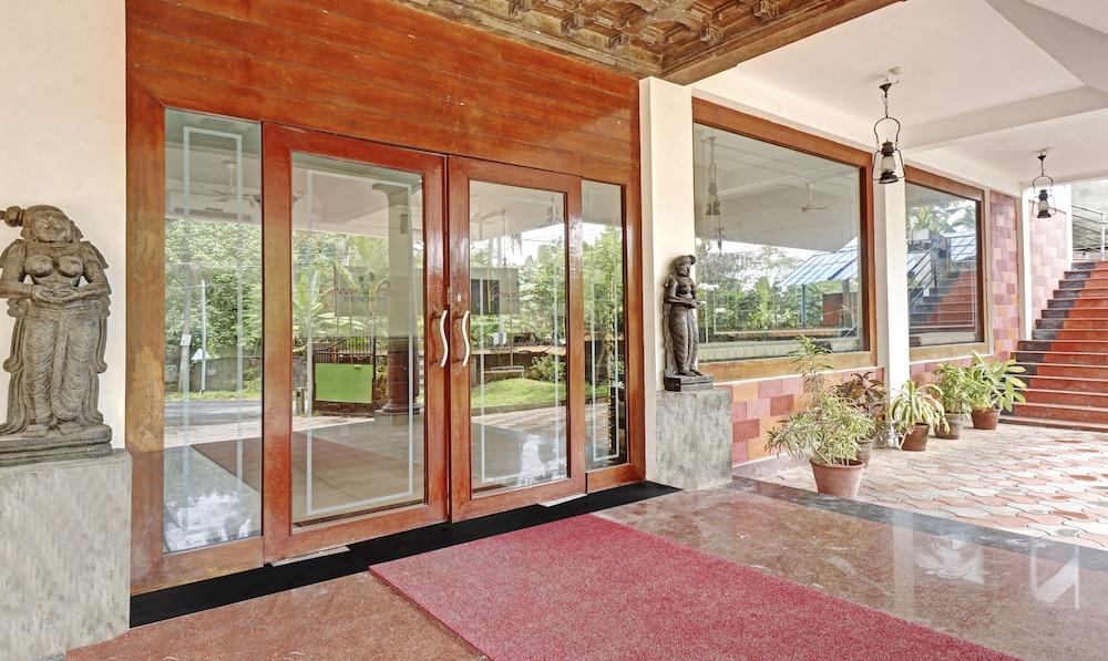 Treebo Trend Green Palm Resorts