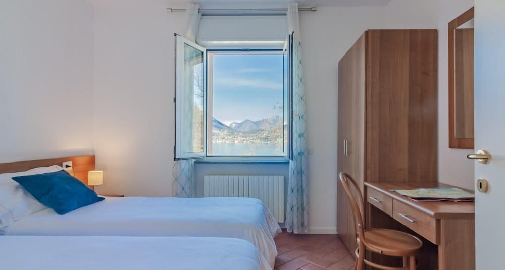 Flower House With Lake View by Wonderful Italy