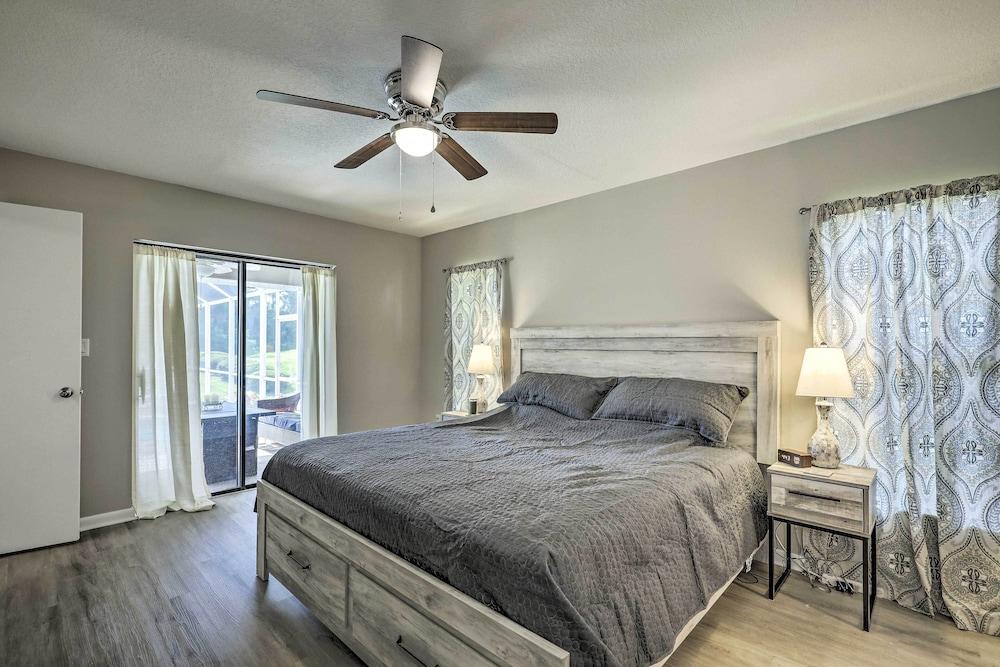 Palm Harbor Home w/ Pool & Golf Course Views!