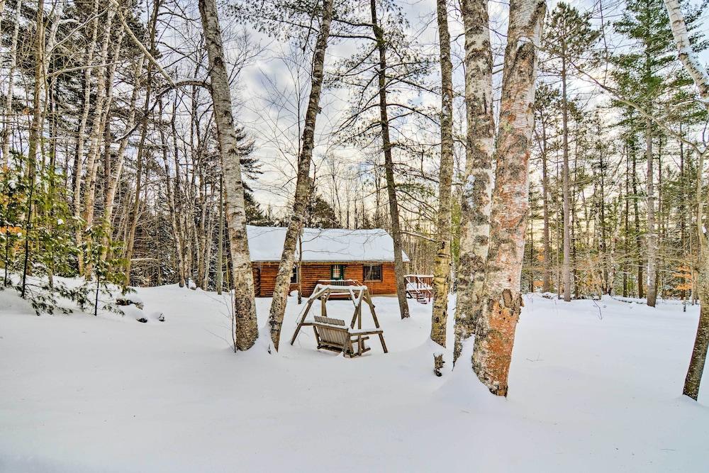 Cozy Manistique Cabin w/ Deck, Grill & Fire Pit!