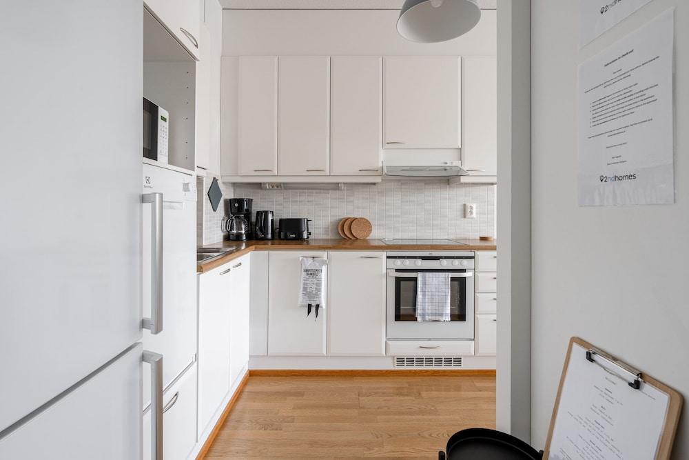 Top Floor 1BR Home with Parking, Sauna and Balcony